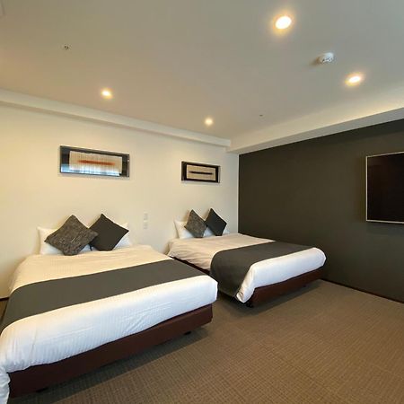 Randor Hotel Sapporo Suites Exteriör bild A room at the hotel