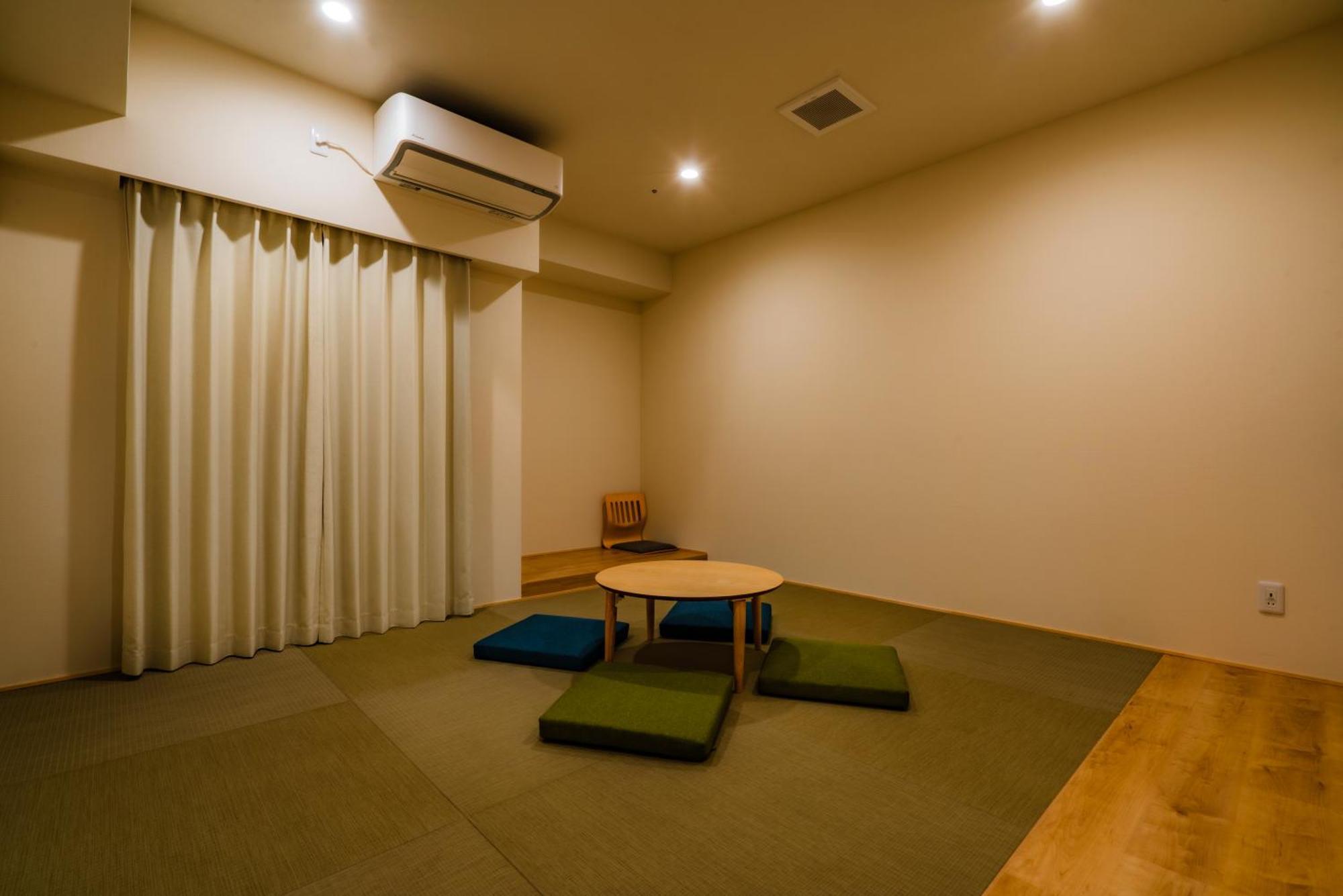 Randor Hotel Sapporo Suites Rum bild A room with a tatami floor