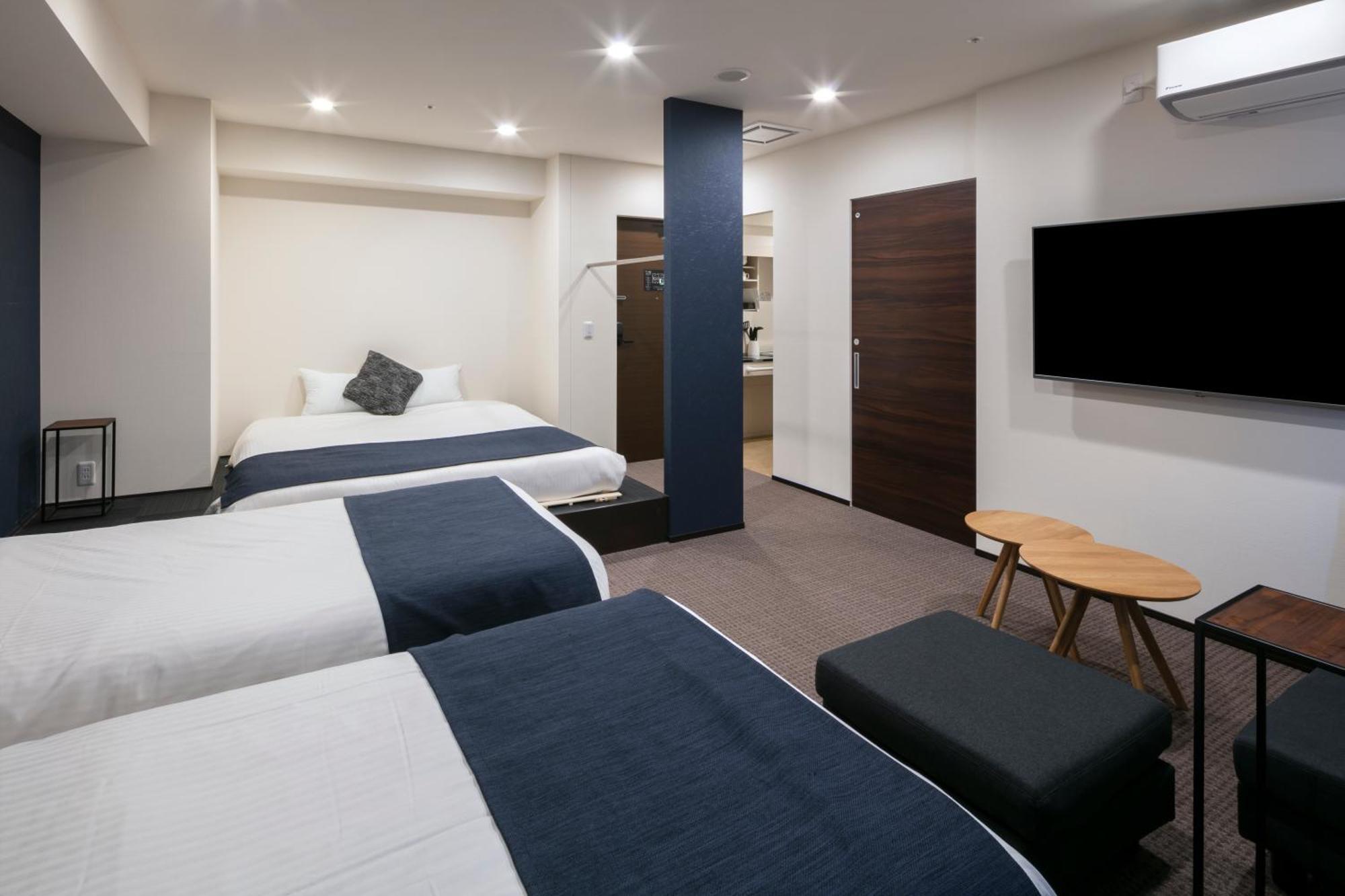 Randor Hotel Sapporo Suites Rum bild A room at the hotel